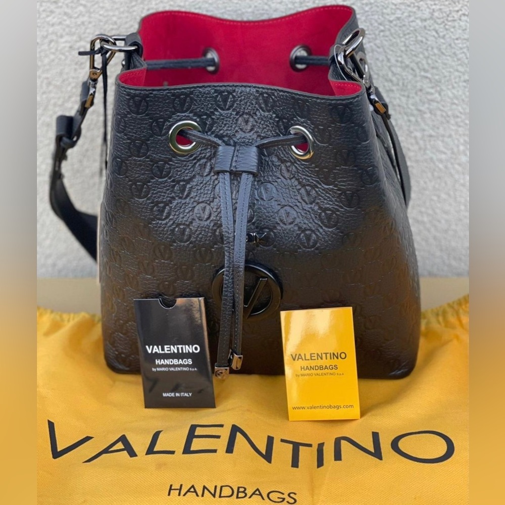 Valentino by Mario Valentino Karl medallion leather bucket bag.